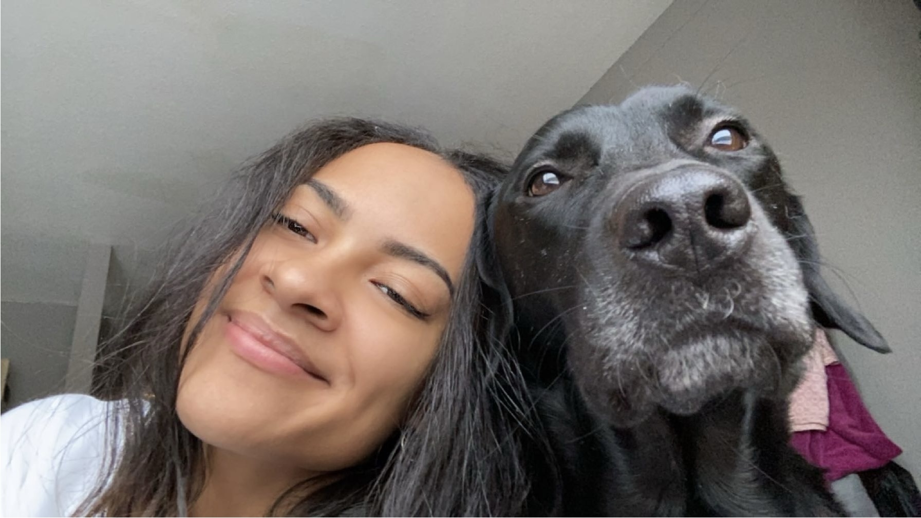 Founder beside dog